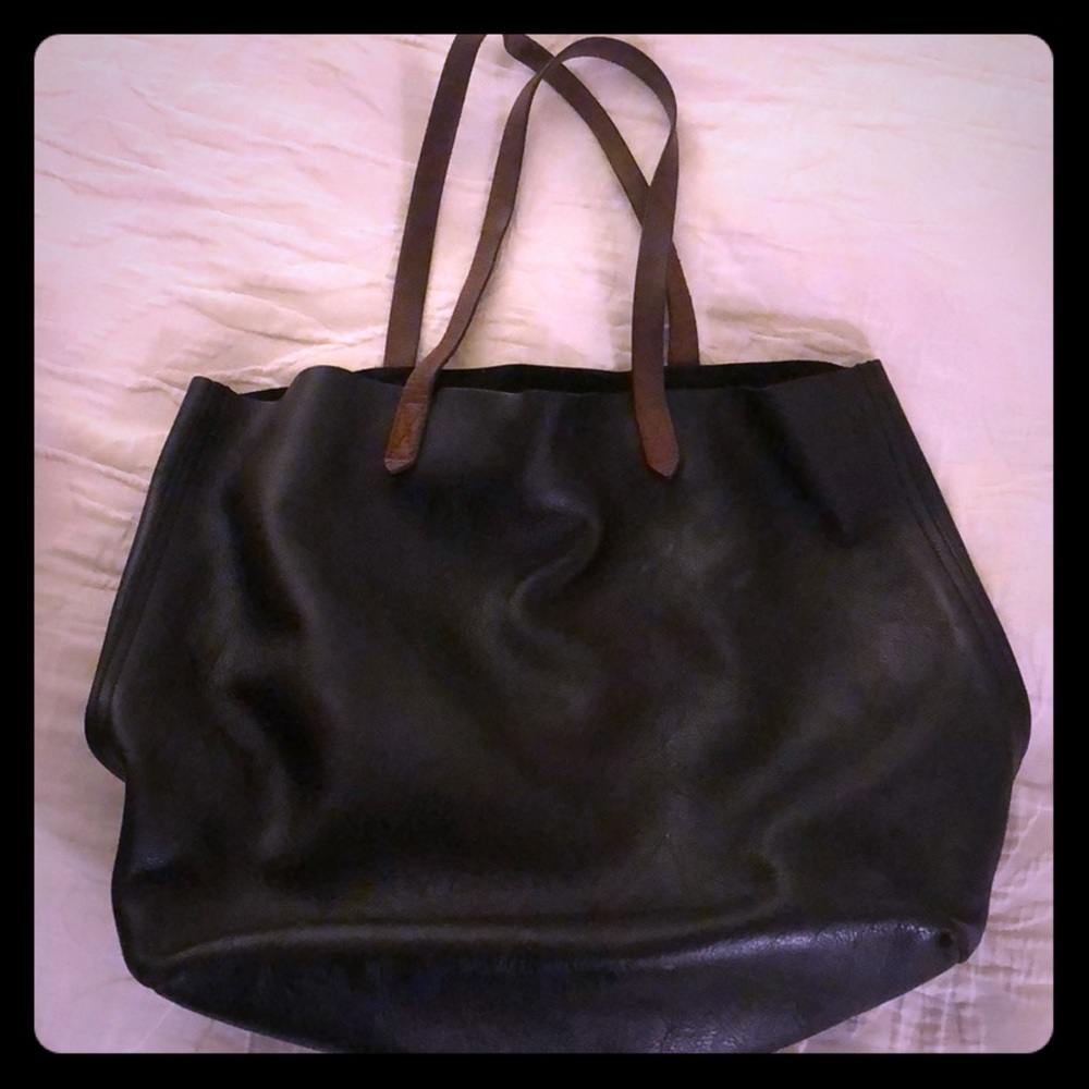 Black tote with brown straps